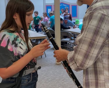 TAHB student checking out the clarinet 
