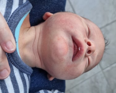 baby having bodywork for breastfeeding difficulties with RM Anika Riesen