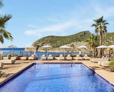 Rooftop Swimming Pool, Palm Trees and Sun Loungers at Zafiro Palace Andratx