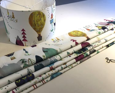 A hand sewn blind with a matching lampshade