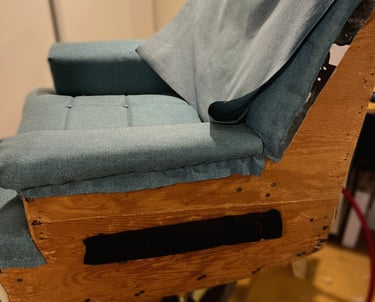 vintage chair in the midst of being reupholstered
