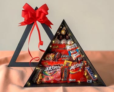 Arreglo de dulces ideal para regalar y para compartir en cualquier ocasion especial, cumpleaños, ani