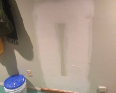 drywall hole in the wall repaired