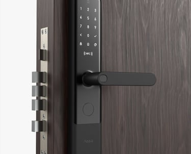 Black Aqara smart door lock with keypad, fingerprint sensor, and NFC for keyless entry home security.