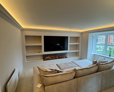 Custom media wall and ambient lighting in modern family living room