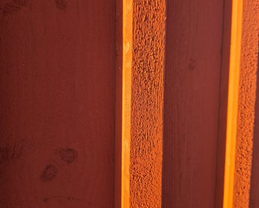 Painting board and batten siding with breathable matte exterior wood paint