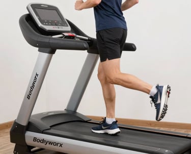 A sleek treadmill set up in a bright, airy home gym space.