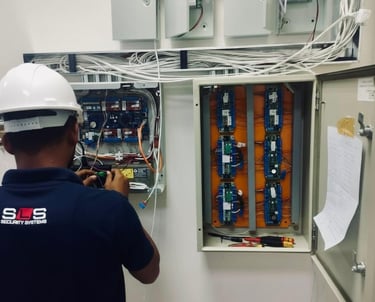 A technician repairing electrical systems