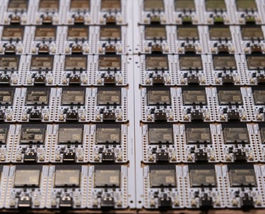 a bunch of ESP32 electronic devices that are sitting on a table