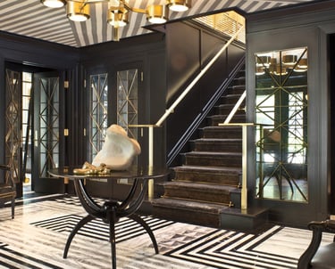 a room with a staircase and a staircase