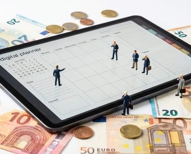 a tablet with a tablet and miniature people figures