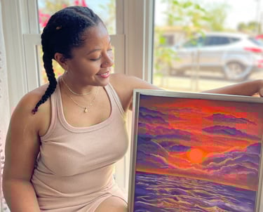 Alexis Peralta and an Arizona themed sunset paining