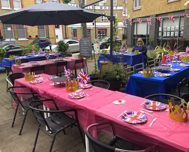 a table with a table set up for a party