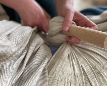 soin rebozo serrage bassin massage au tissu