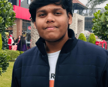 a man in a black jacket and a white shirt