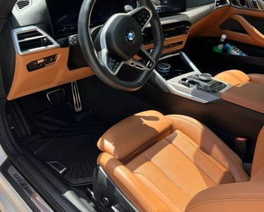 Immaculate interior of a luxury BMW after professional interior detailing service in Miami.