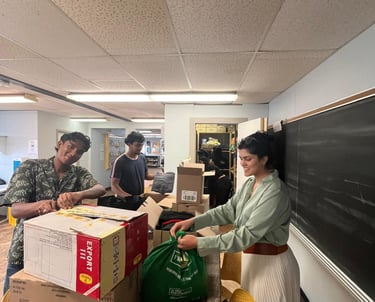 Volunteers organizing clothing for A Better Tent City