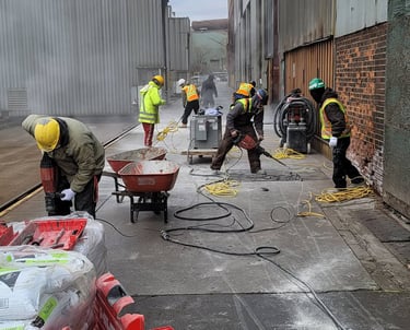 a group of men working on a construction site