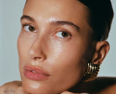 Hailey Bieber a woman with a tattoo on her hand