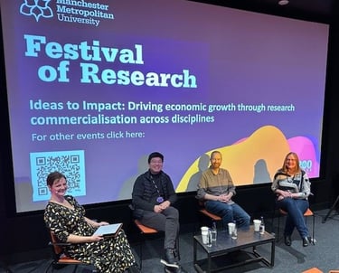 Strategic support for leaders designing new initatives. Image of panel at festival of research.