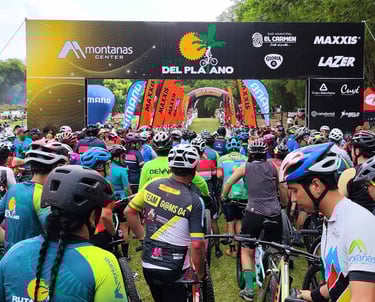 a group of people riding bikes in a field