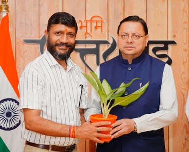 Santosh Khanduri with Chief Minister Dhami