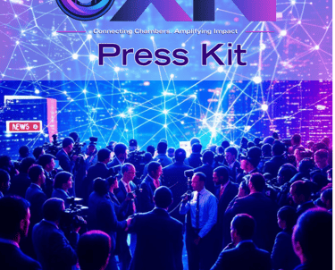 a crowd of people standing around a press kit