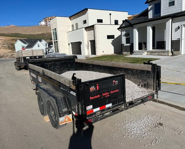 A trailer filled with gravel to be delivered