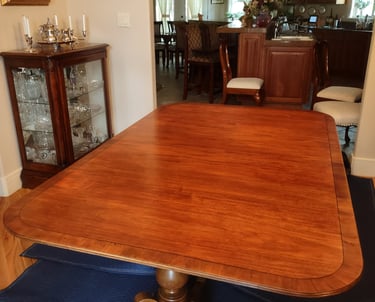 Restored maple dining table that was in the back yard for 10 years. They raised two families on it.