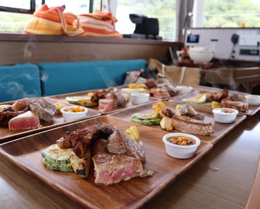 Gourmet steak lunch prepared by private chef onboard luxury catamaran tour in Costa Rica