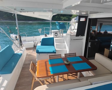 Spacious deck and dining area onboard Kephas luxury catamaran in Papagayo, Costa Rica