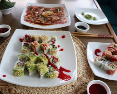 Fresh sushi and tuna tartar prepared by onboard chef during Kephas catamaran tour in Papagayo