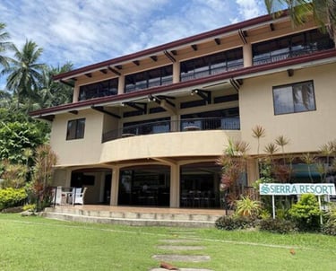 The Pool and gardens at The Sierra Resort ideal to unwind after a day diving