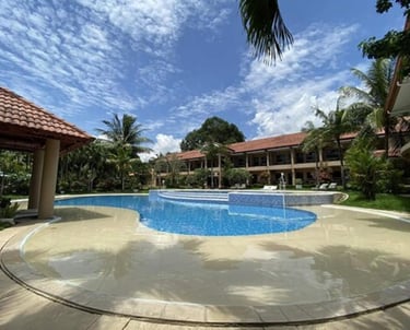 The Pool and gardens at The Sierra Resort ideal to unwind after a day diving