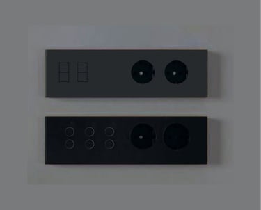 Diseño minimalista con interruptores empotrados en pared blanca junto a escalera contemporánea