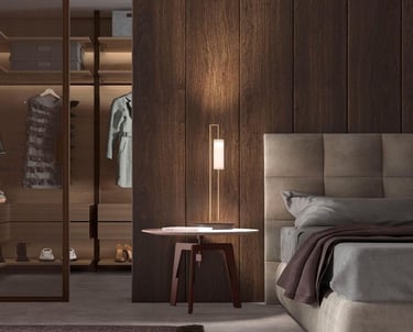 Espacio de dormitorio con vestidor semiabierto en madera y puerta corredera con textura vertical