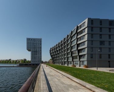 a building with a long walkway in Almere Stad