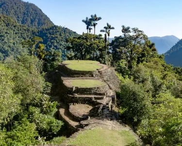 Ancient stone terraces of Ciudad Perdida, the Lost City, nestled in the lush Colombian jungle.