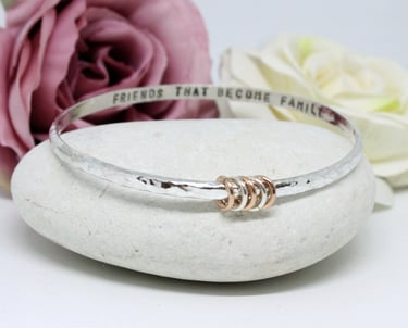 Personalised Silver Bangle with a hidden message and a silver and gold ring to represent a loved one