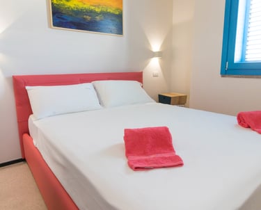 a bed with towels and towels on it