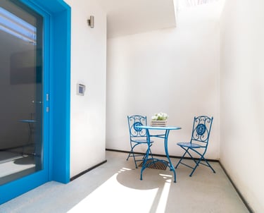 a table with a table and chairs in a room