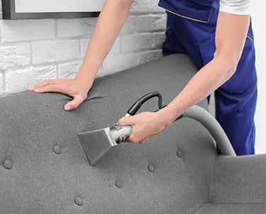 a person  Upholstery Cleaning in Milwaukee