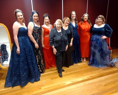 The seven sopranos who performed Ride of the Valkyries, with former SOS President Leona Geeves.