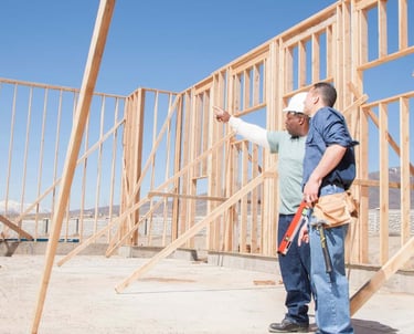 a man in a construction site with a construction worker