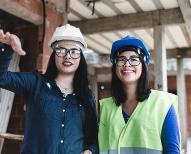two women in safety vests and safety vests