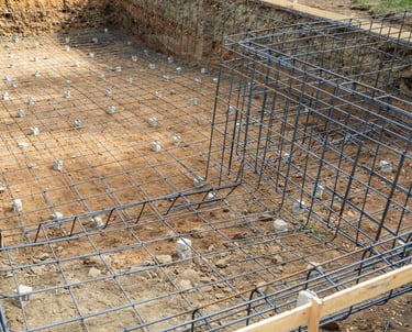 a construction worker is working on a concrete slab