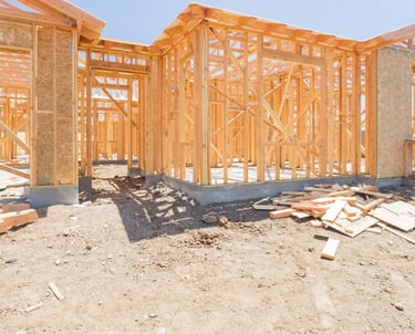 a house being built with wooden framing and framing
