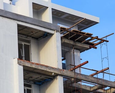 a building with a clock tower in the background