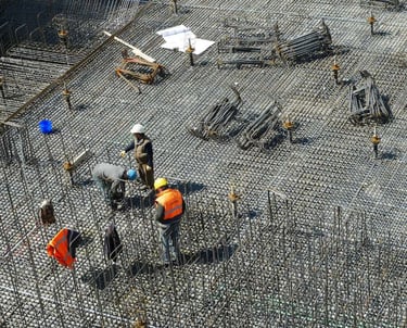 a group of workers working on a construction site