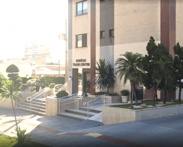 a building with a bunch of trees and a building